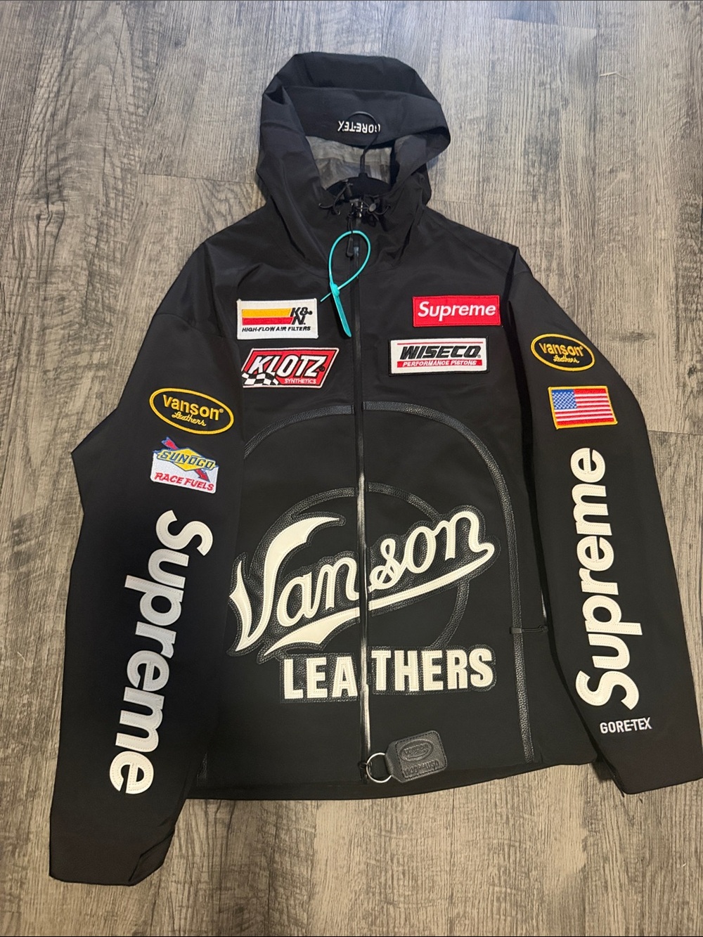 Supreme Black Patchwork Racing Logo Raincoat
